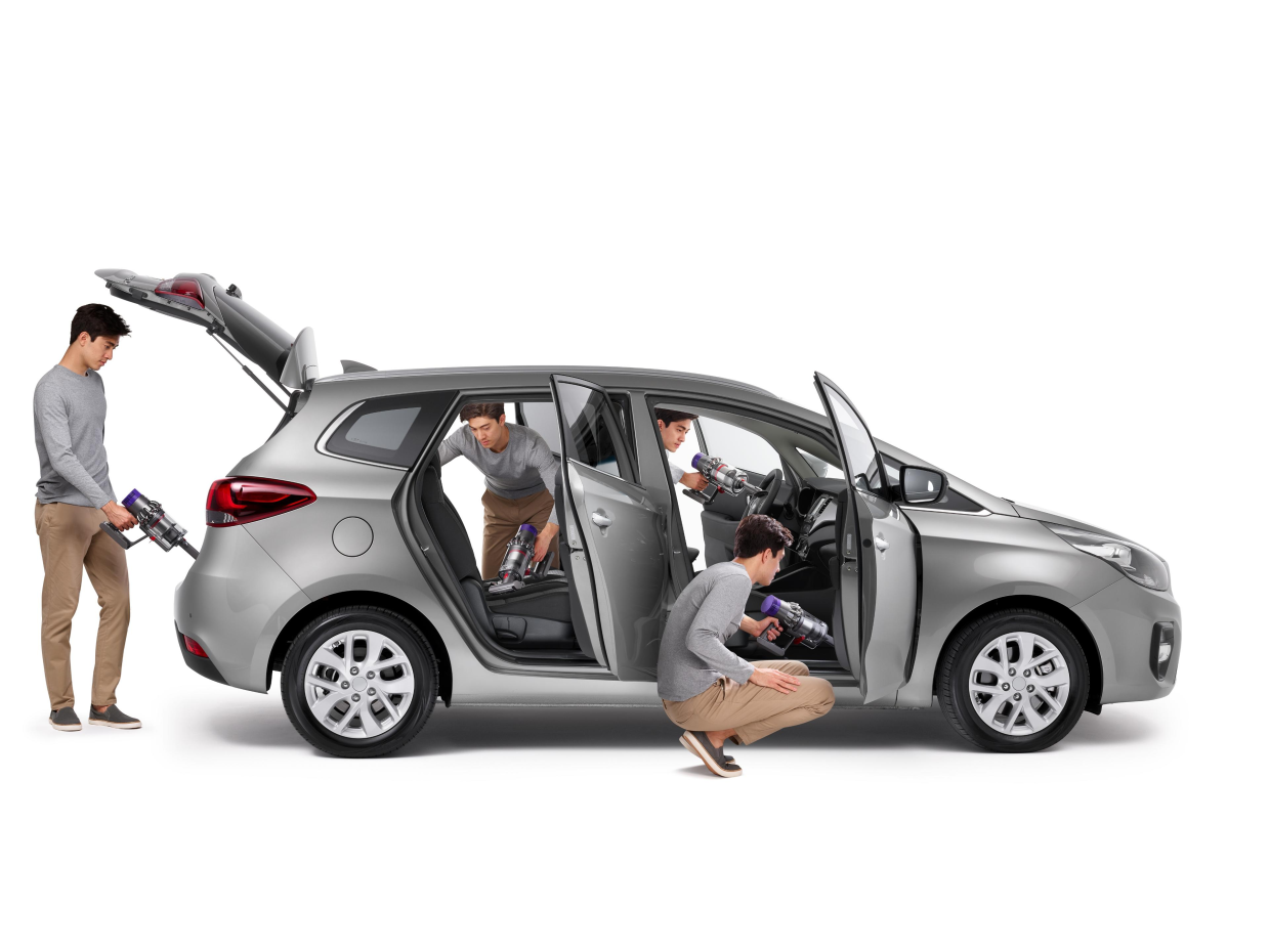 Автокөлікті шаңсорғыштың көмегімен тазалау